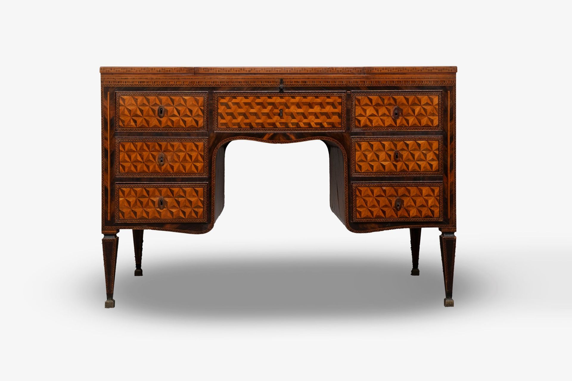 Exceptional Louis XVI center desk inlaid in various essences with geometric motifs, Northern Italy,