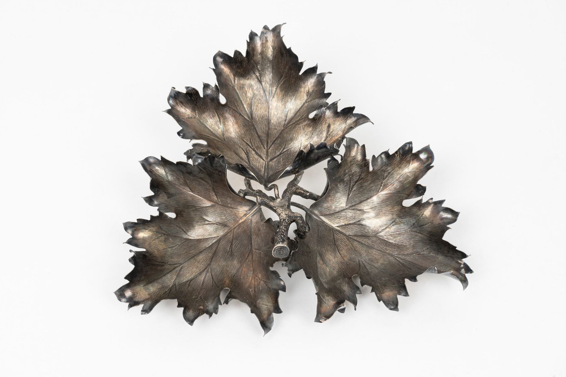 Silver centerpiece in the shape of three vine leaves, 20th century
