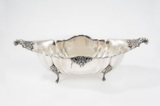 Silver centerpiece with rocaille grips, 20th century