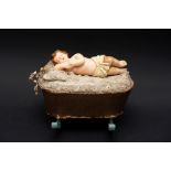 Painted wax baby on cradle with music box and rocking chair, Sicily, early 20th century