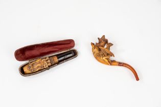 Two foam and amber mouthpieces, 19th century