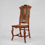 Chinoiserie carved and red lacquered wooden chair, probably England, 18th century