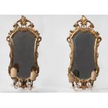 Pair of carved and gilded wooden mirrors, 20th century