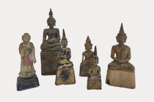 Six small wooden sculptures representing Buddha, Thailand, 20th century