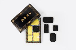 Set composed of five calligraphy ink tablets in a lacquer case, China, early 20th century
