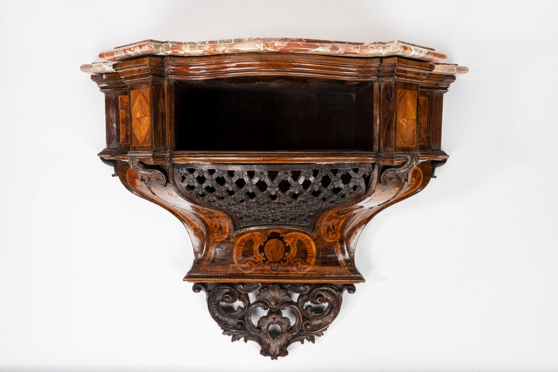 Important small wall console in carved and inlaid wood, with rocaille motifs, 18th century