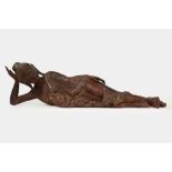 Cinnabar lacquered wood sculpture depicting reclining Buddha, Burma, 19th-20th centuries