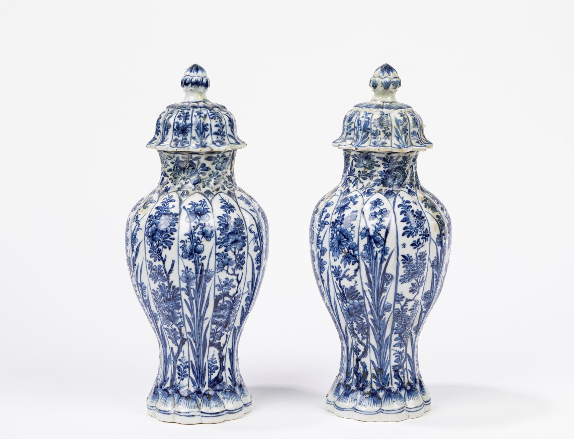 Pair of blue and white porcelain jars with lids, Delft 18th century