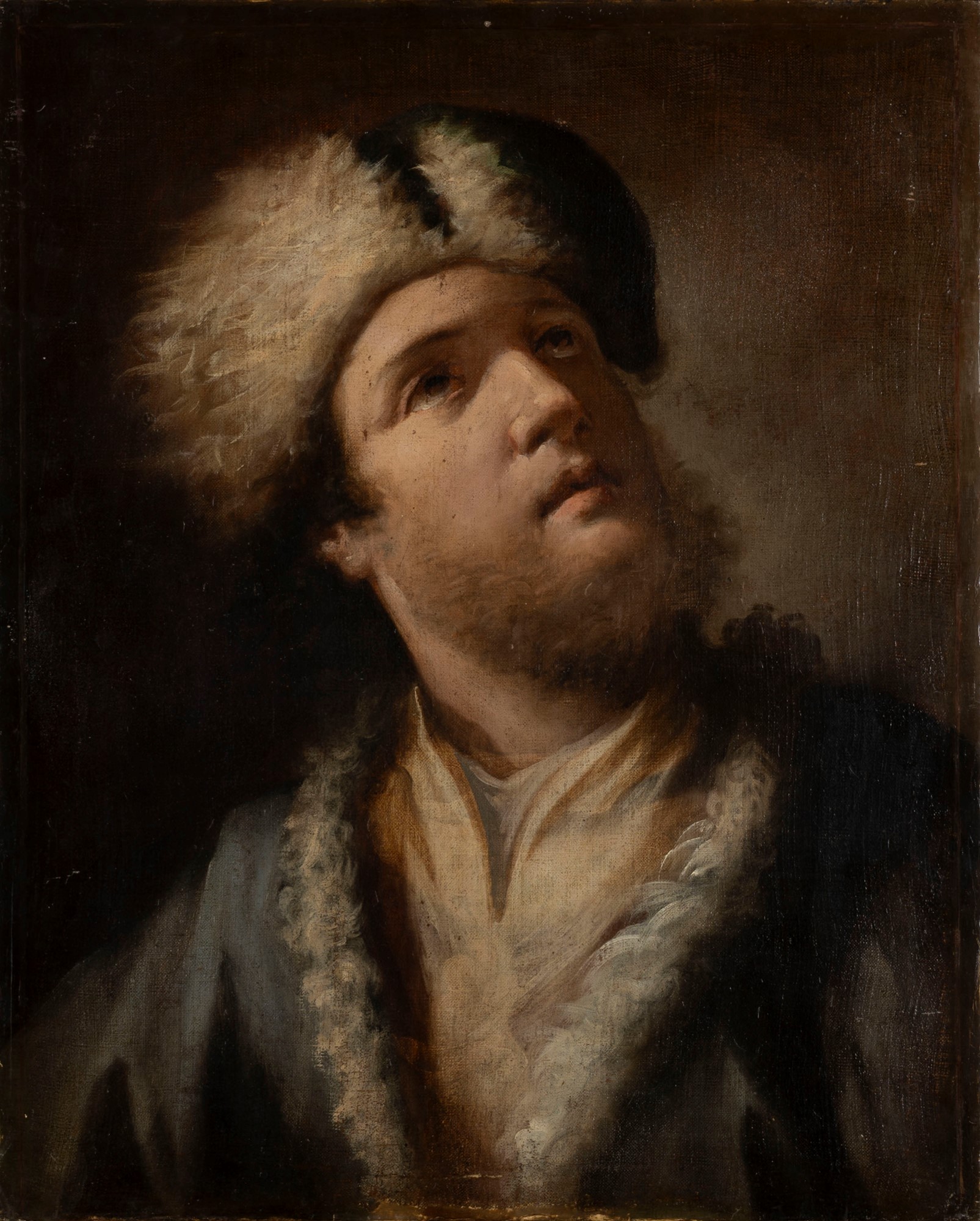Venetian school, eighteenth century - Half-length portrait of a young man with fur hat and blue tail