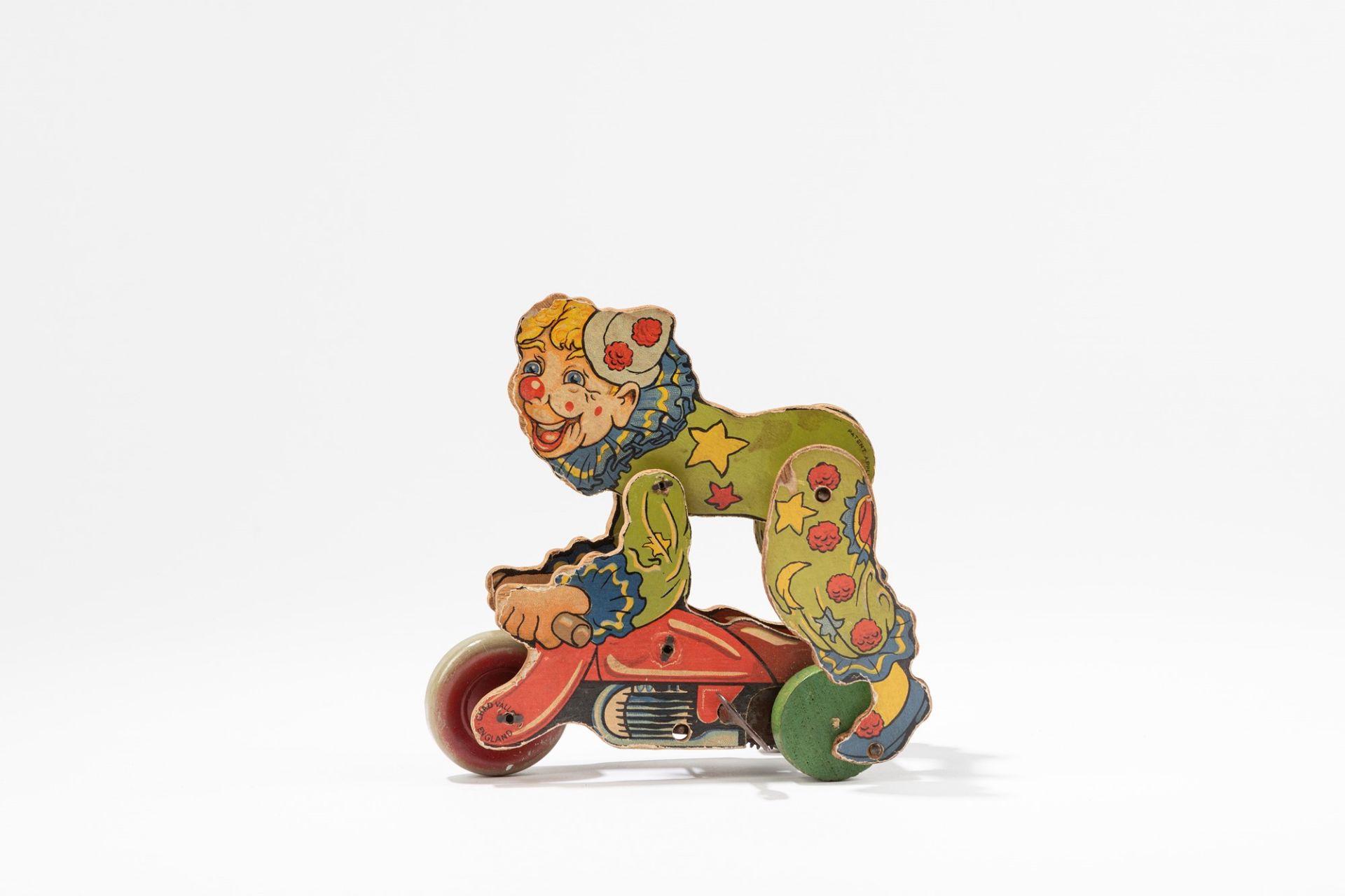 Chad Valley - Clown on motorcycle, 1930-1940