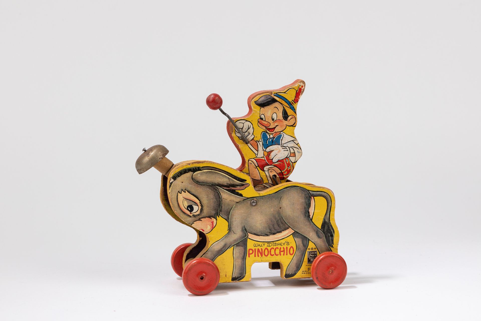 Fisher Price - Pinocchio on donkey, 1940-1950