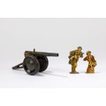 Marx Toys - Two flat tin soldiers and a cannon, 1950-1960
