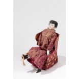 Doll with armchair, 1880-1890