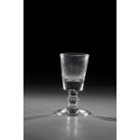 Shot glass Germany, 18th century Colourless glass with solid shaft with ring disc. H. 11.5 cm.