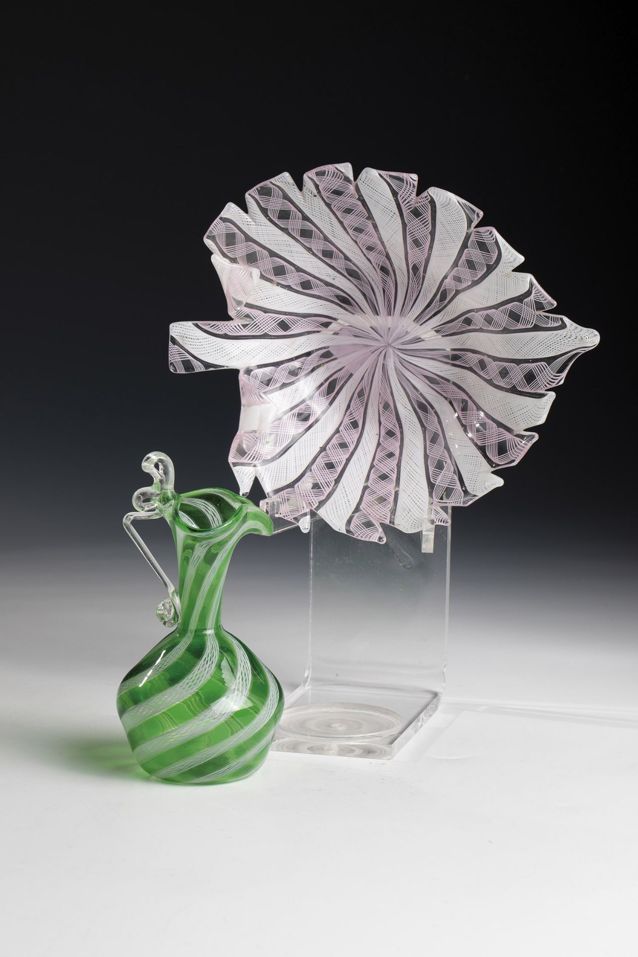 Leaf bowl and small jug Murano, late 20th century Colourless glass with alternating melted '