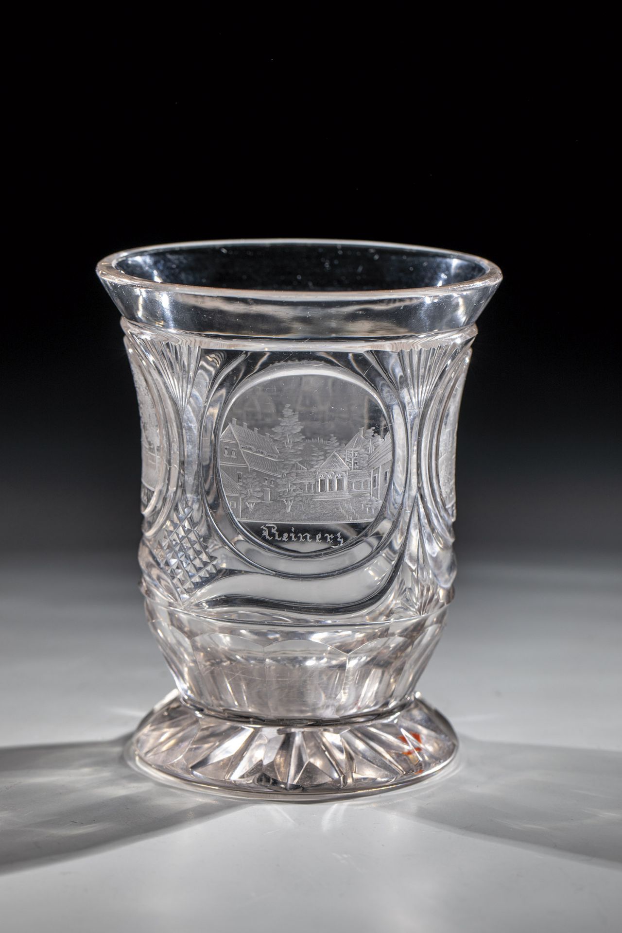 Bell beaker with views of Silesia, 19th century Colourless glass with rich cut decoration. Four