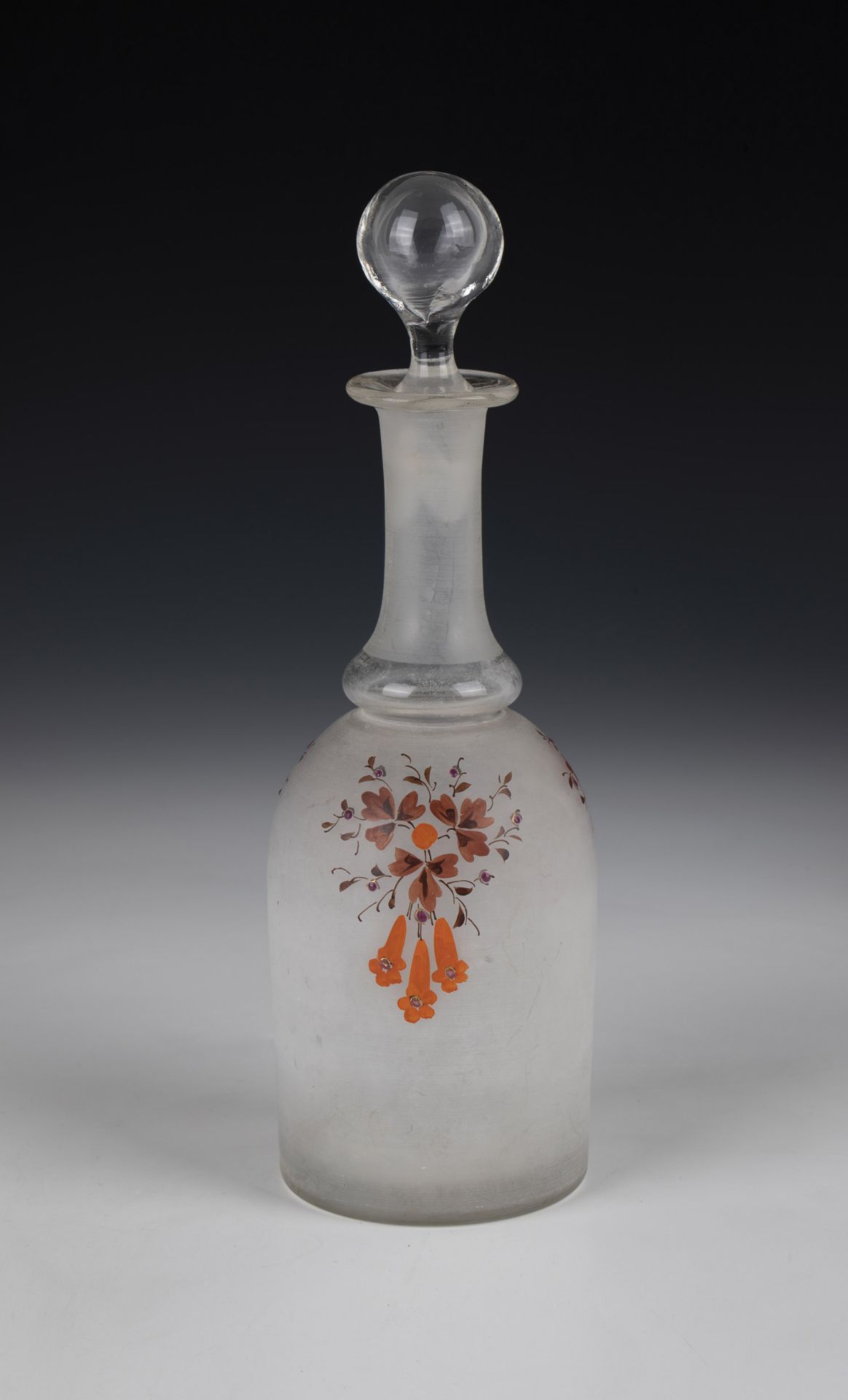 Bottle with stopper 19th century Colourless, frosted glass. Floral decor applied in enamel. H. 22