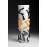 Vase Mihail Topescu (1956) Colorless glass, opaque white underlay. On the wall, freely applied,