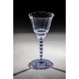 Wine glass Ludwig Moser, Karlovy Vary, ca. 1930 Alexandrite glass, optically blown and faceted.