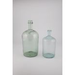 Two storage bottles of Austria, 19th century Light green glass with a raised bottom and tear-off. On