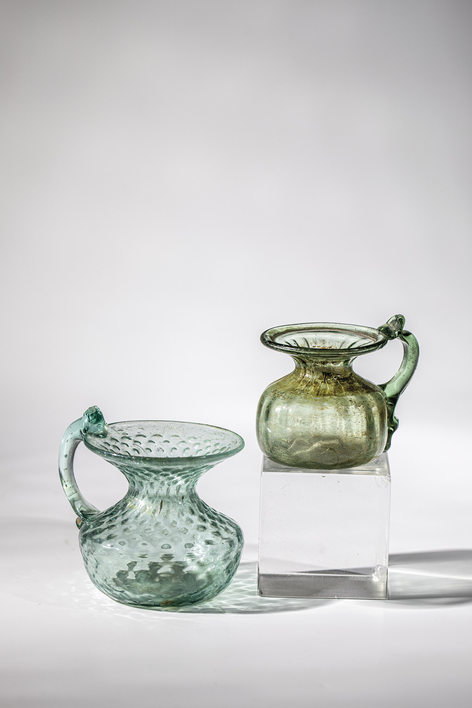 Two ink vessels Germany, 18th century tear-off glasses. Green or blue-green glass, constricted below