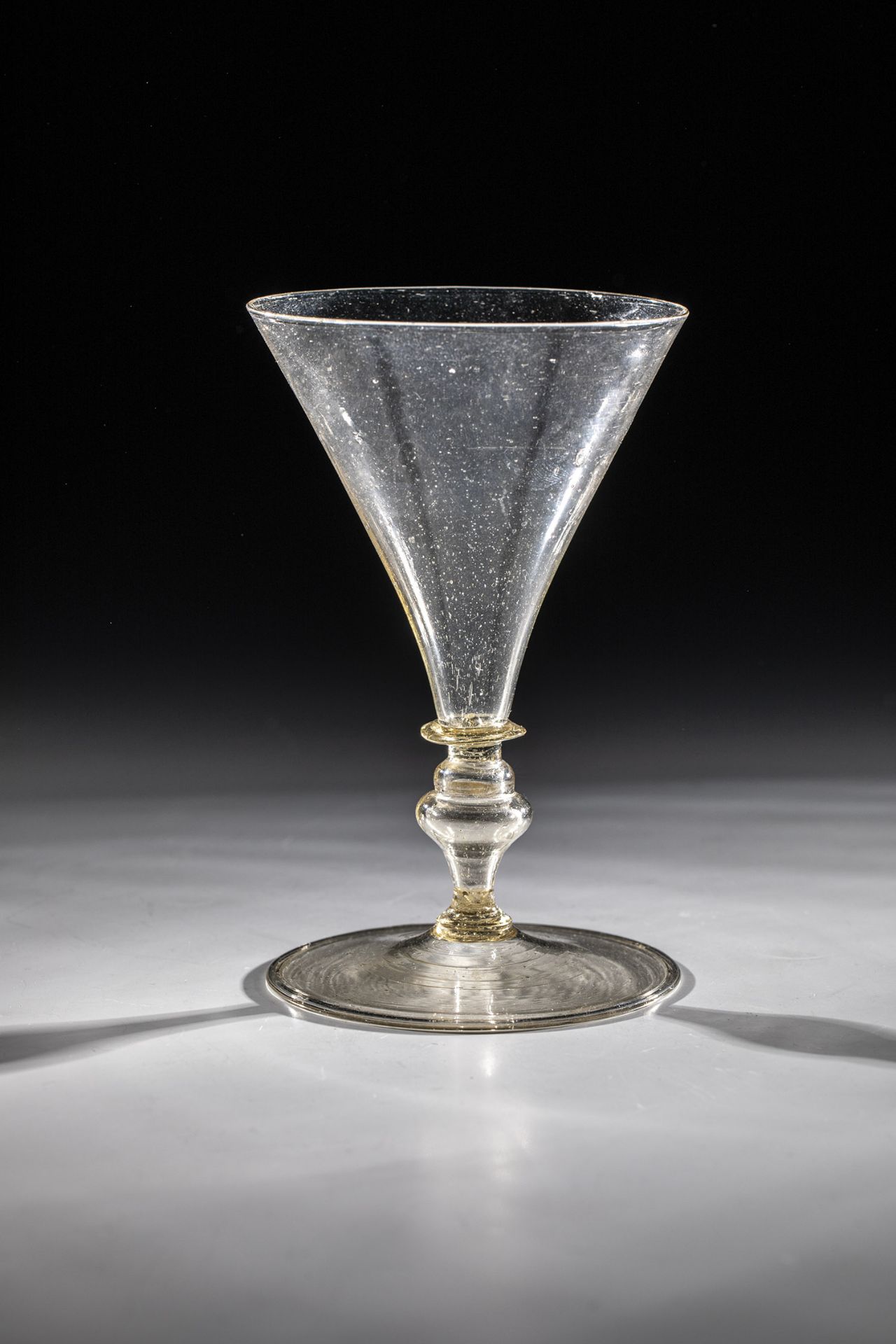 Rare goblet Venice or Facon de Venise, 17th century Lightly smoked, thin-walled glass. Disc base
