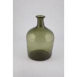 Large storage bottle of southern Germany, 19th century Green glass with demolition. H. 36.5 cm.