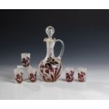 Liqueur carafe with five Stampers France, ca. 1900 Colourless glass, dark red overlay. All around