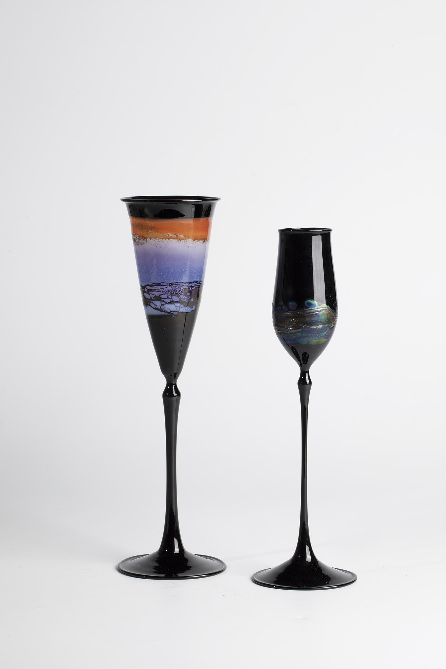 Two stem glasses Walter Bahr, 1985 Artist's stemmed glass, free-form, dark violet glass with lustful