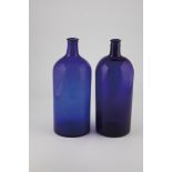 Two storage bottles of France, 19th century Cobalt blue glass. A part with scratched-in numbers.