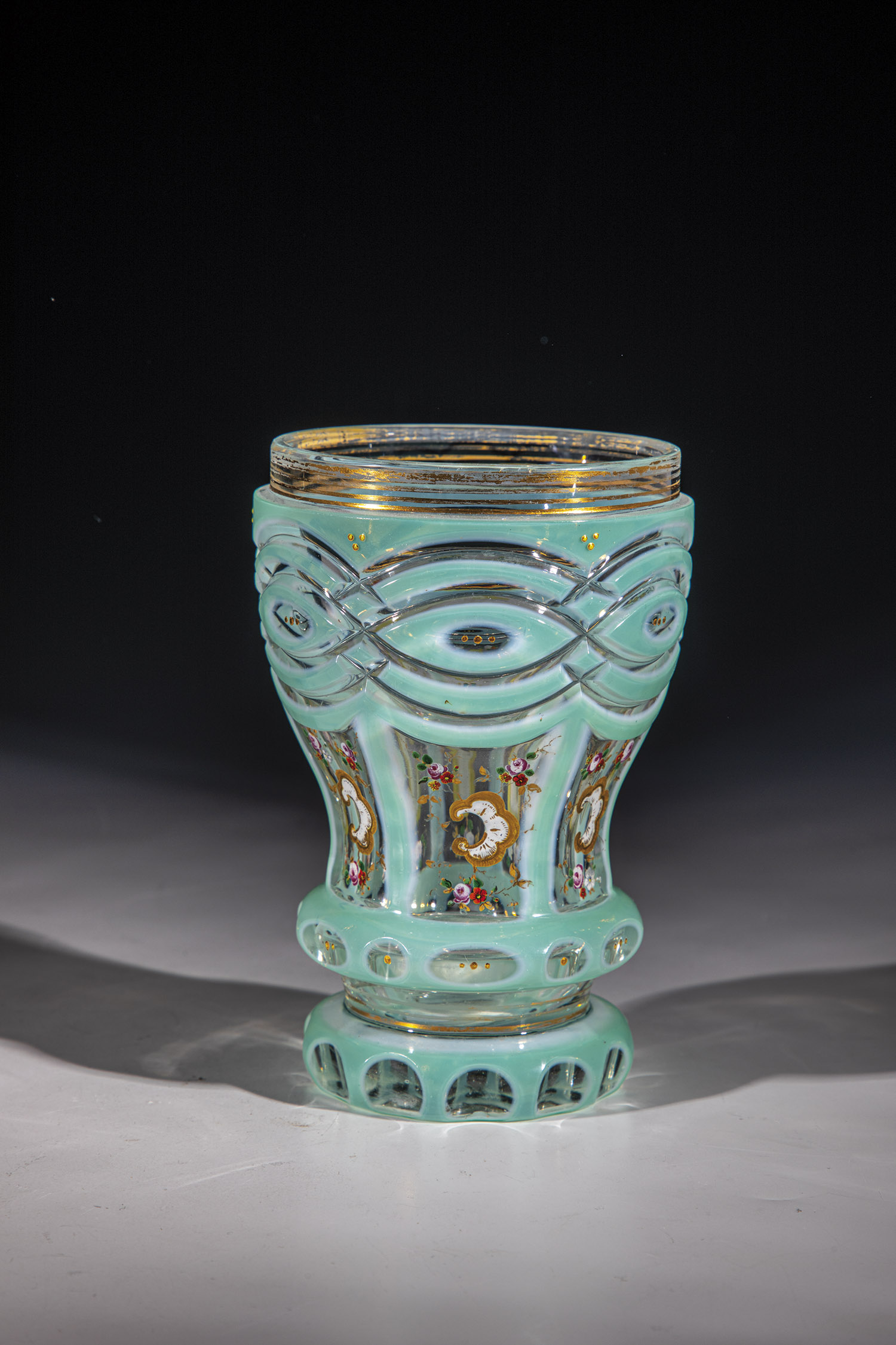 Double-cased foot cup Bohemia, M. 19th century Colourless glass with agatinopal and uranium-