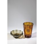 Bowl and vase Bohemia, ca. 1925/30 Smoked or amber glass, faceted cut. Vase circumferential with