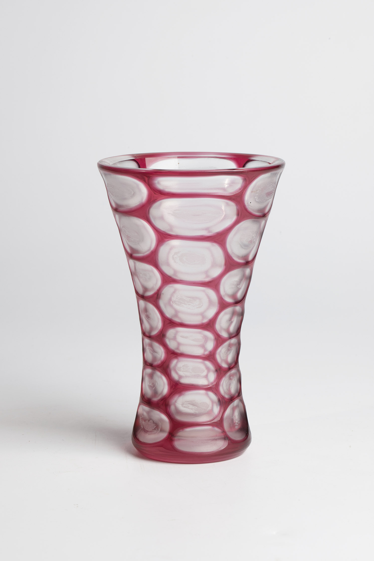 Beaker vase German, 1978 Colourless glass, ruby red overlay. Sanded and frosted. Underside