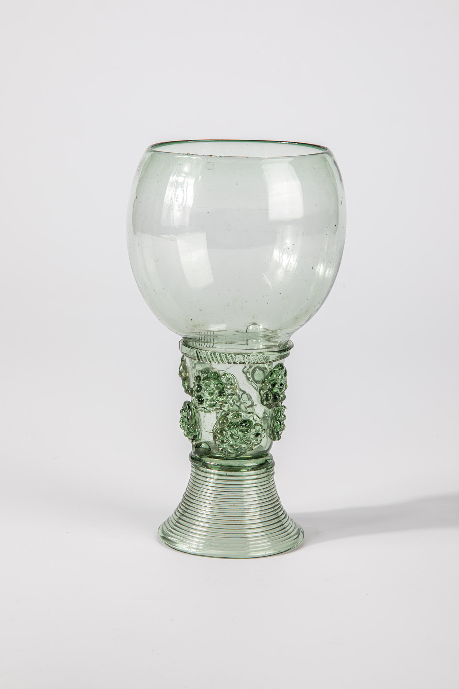 Roman German or Netherlands, 17th century Light green glass with spun base, raised bottom with tear,