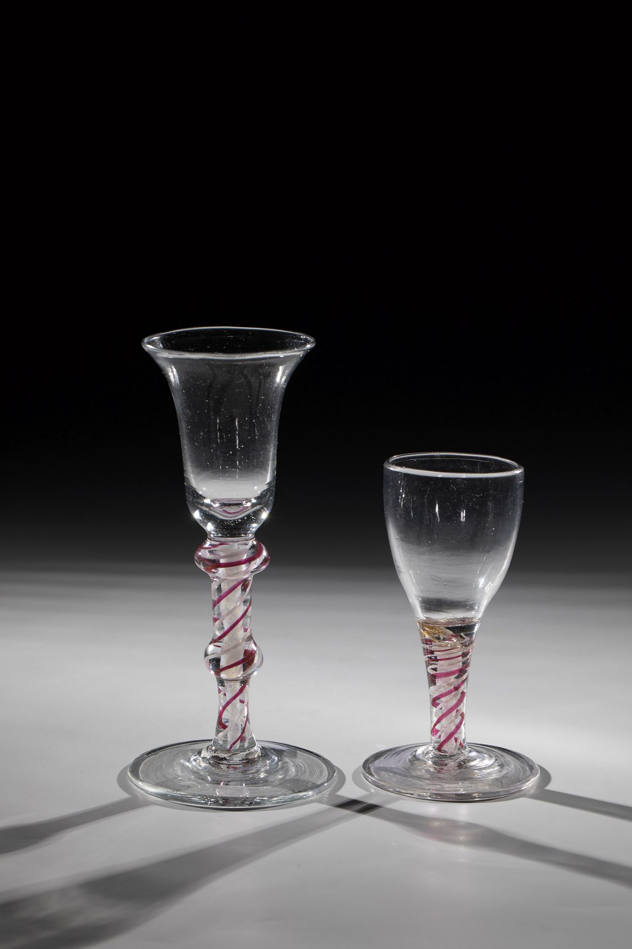 Two thread glasses Holland or Belgium, 17th century disc base with tear. Shaft with two nodes as