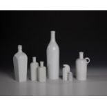 Mixed lot: Seven frosted glass bottles 19th/20th century Various shapes, including two Odol