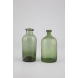 Two Bottles of Germany, 19th Century Light green glass with raised bottom and tear-off. H. 18.5 to