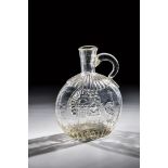 Flat bottle with handle Austria, 19th century Grey-tinted glass blown in the model with tear-off and