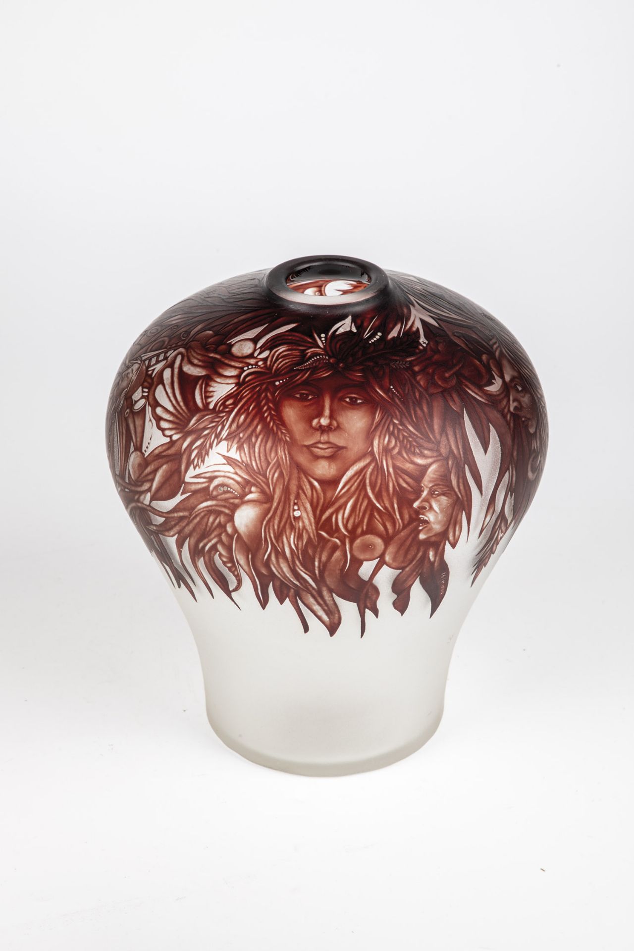 Vase Jerzy Maraj, 1991 Colourless glass, cut and frosted. Floral decoration all around with faces in