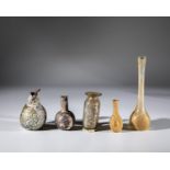 Five miniature vials Middle East, 1st-3rd century AD Bottom finds. Colourless, greenish or violet