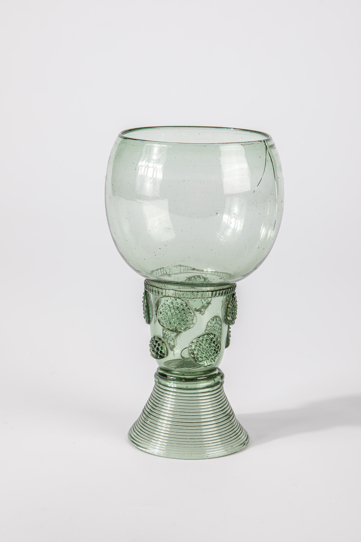 Roman German or Netherlands 17th century Light green glass, spun base with tear, upper open shaft