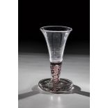 Thread glass Netherlands, E. 17th / A. 18th century Colourless glass with pane base and tear.