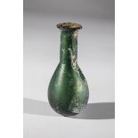 Drop-shaped vial Eastern Mediterranean, 1st-4th century AD. Green glass. H. 7.7 cm