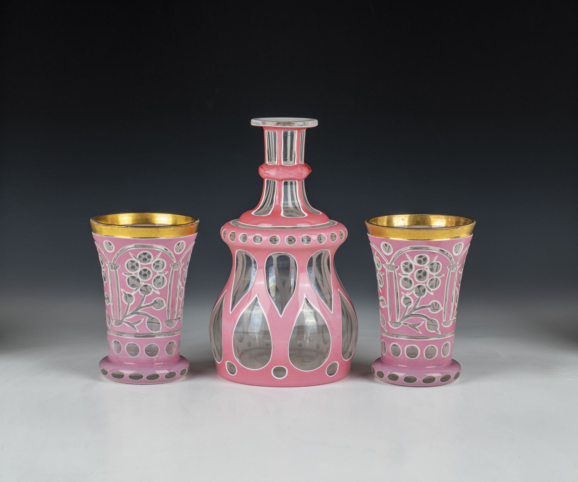 Carafe and two cups with double overlay North Bohemia. 19th century Colourless glass with pewter