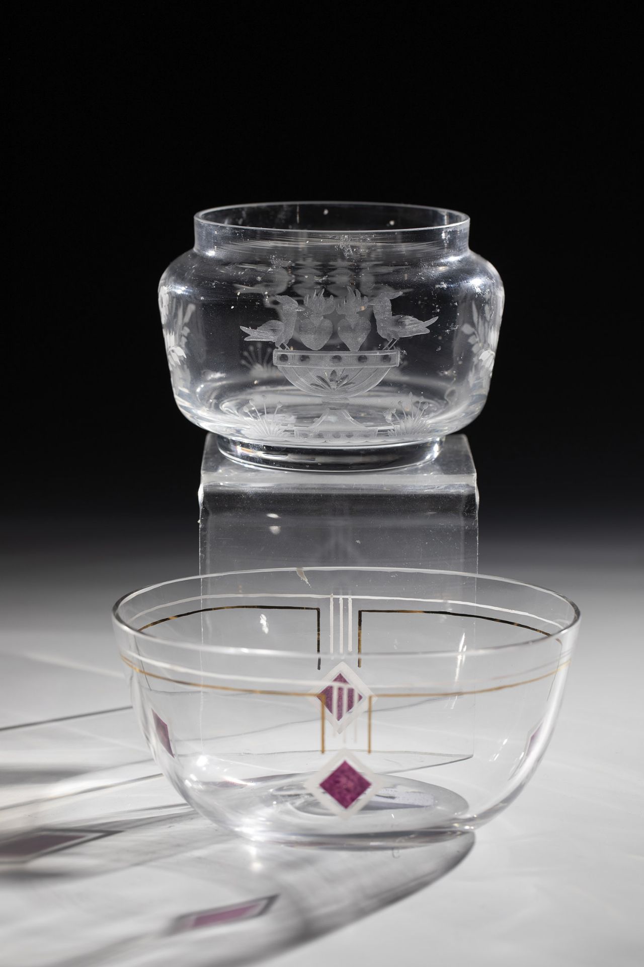 Two bowls Erwin Eisch and J. & L. Lobmeyr, Vienna, 20th century. Colorless glass. Decors cut and