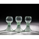 Set of three Romans Germany, 18th century Light green glass with demolition. Flared, spun foot. On