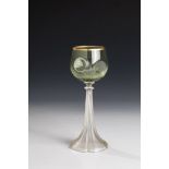 Roman Bohemia, ca. 1920/30 Colourless glass, the trumpet base spun. Kuppa green underlay as well