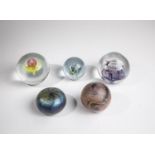 Five paperweights, 20th century, mixed lot of five paperweights made of glass. A paperweight with