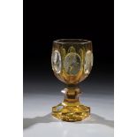 Foot cup Bohemia, 19th century Colourless, partly yellow stained glass. Stand with notched finish.