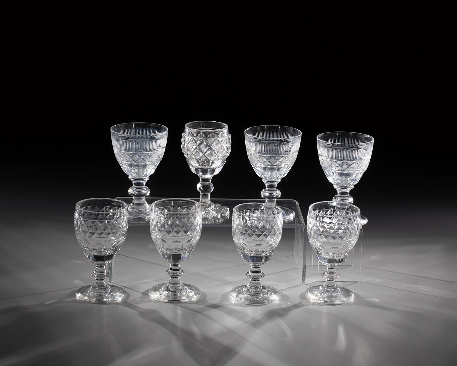 Mixed lot of eightSweet wine glasses England or France, 19th century Colourless glass with richly